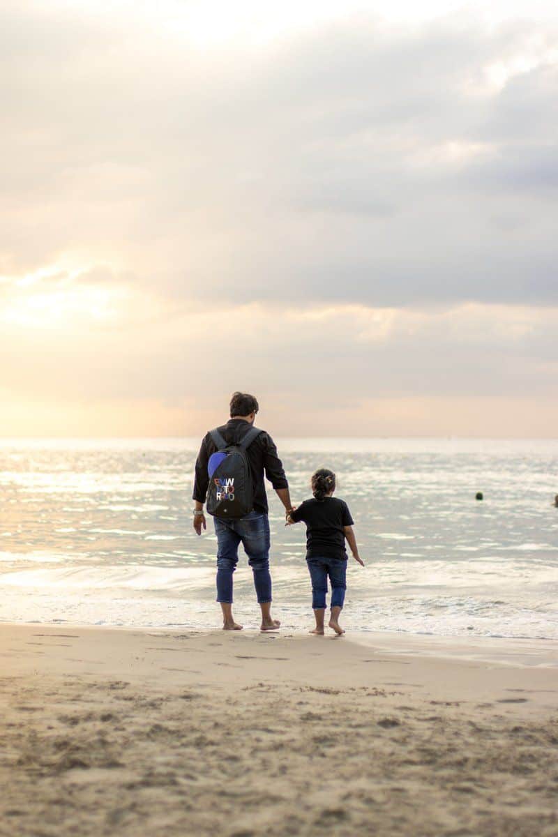 Father with Daughter on Beach · Free Stock Photo