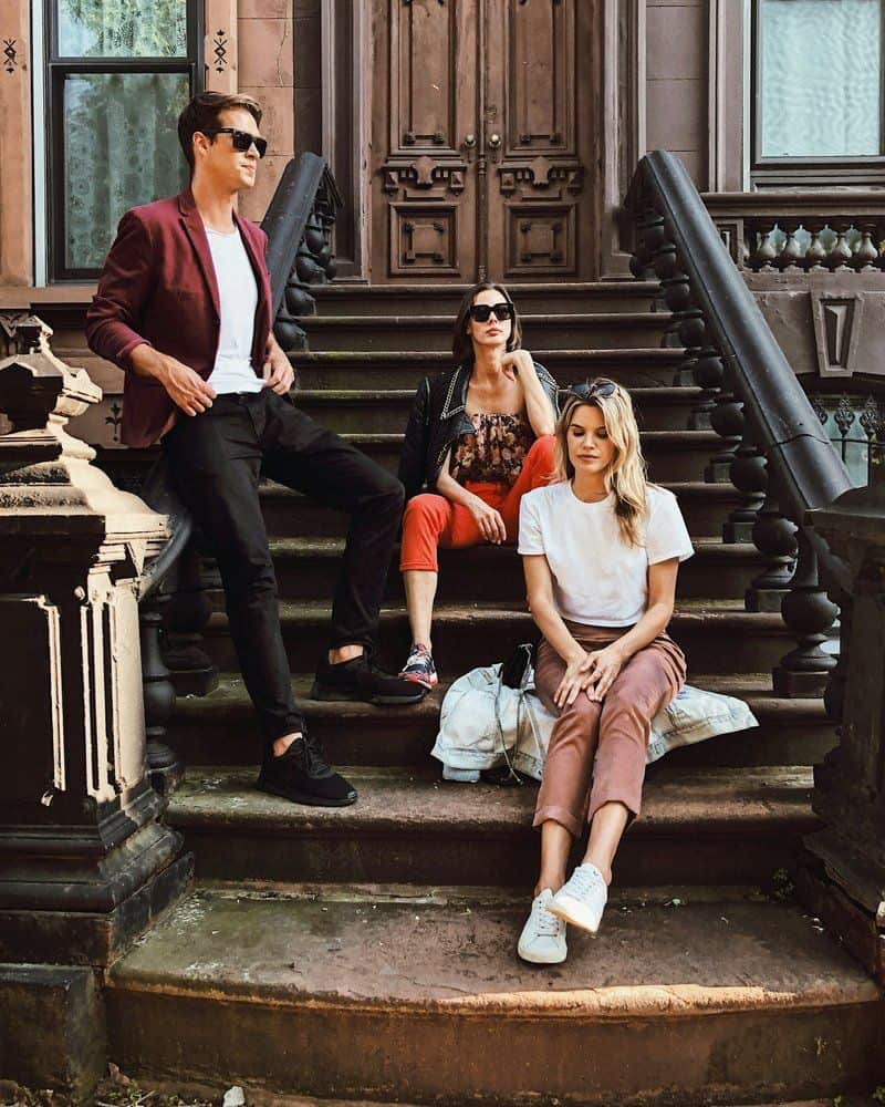 Two women sitting and man standing on stair photo – Free Woman Image on Unsplash Two women sitting and man standing on stair photo – Free Woman Image on Unsplash