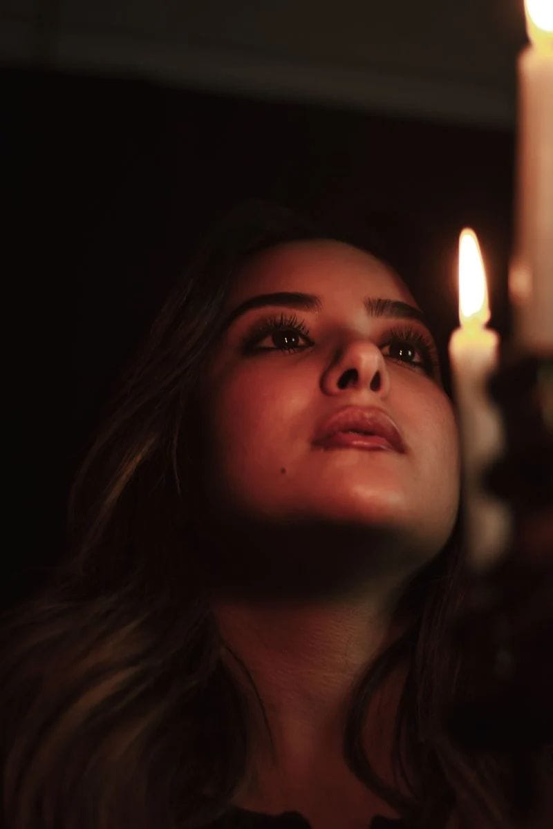 Portrait of Woman by Candlelight in Dark Setting · Free Stock Photo Portrait of Woman by Candlelight in Dark Setting · Free Stock Photo
