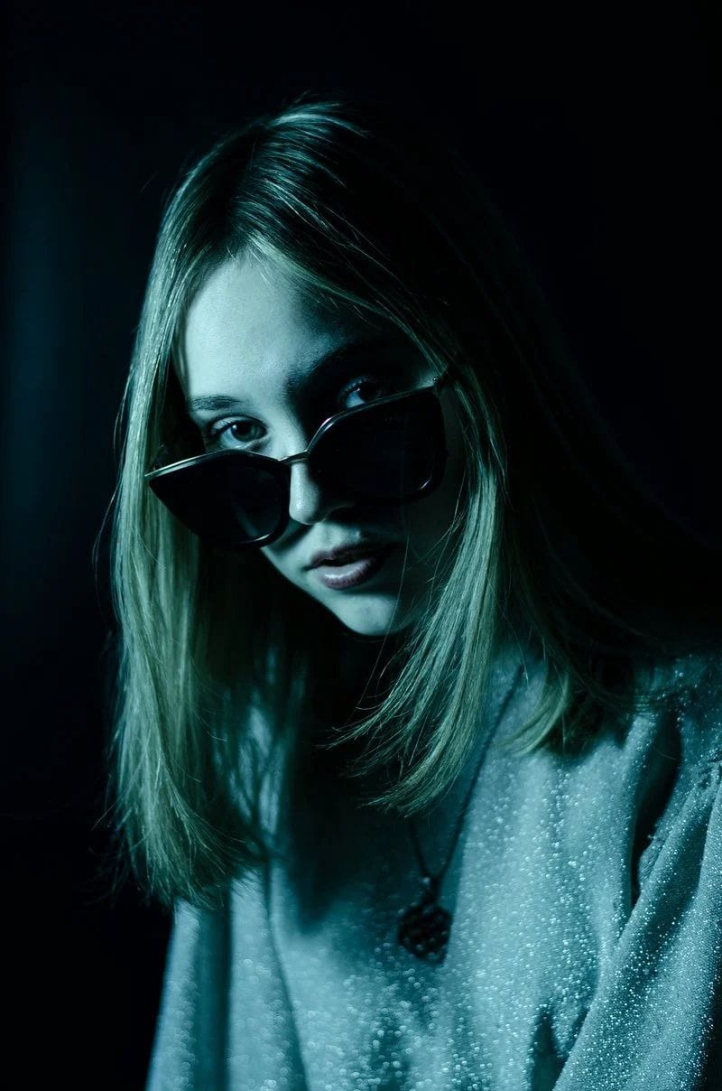 A woman with sunglasses on her face in the dark - Free Photo on Unsplash A woman with sunglasses on her face in the dark - Free Photo on Unsplash
