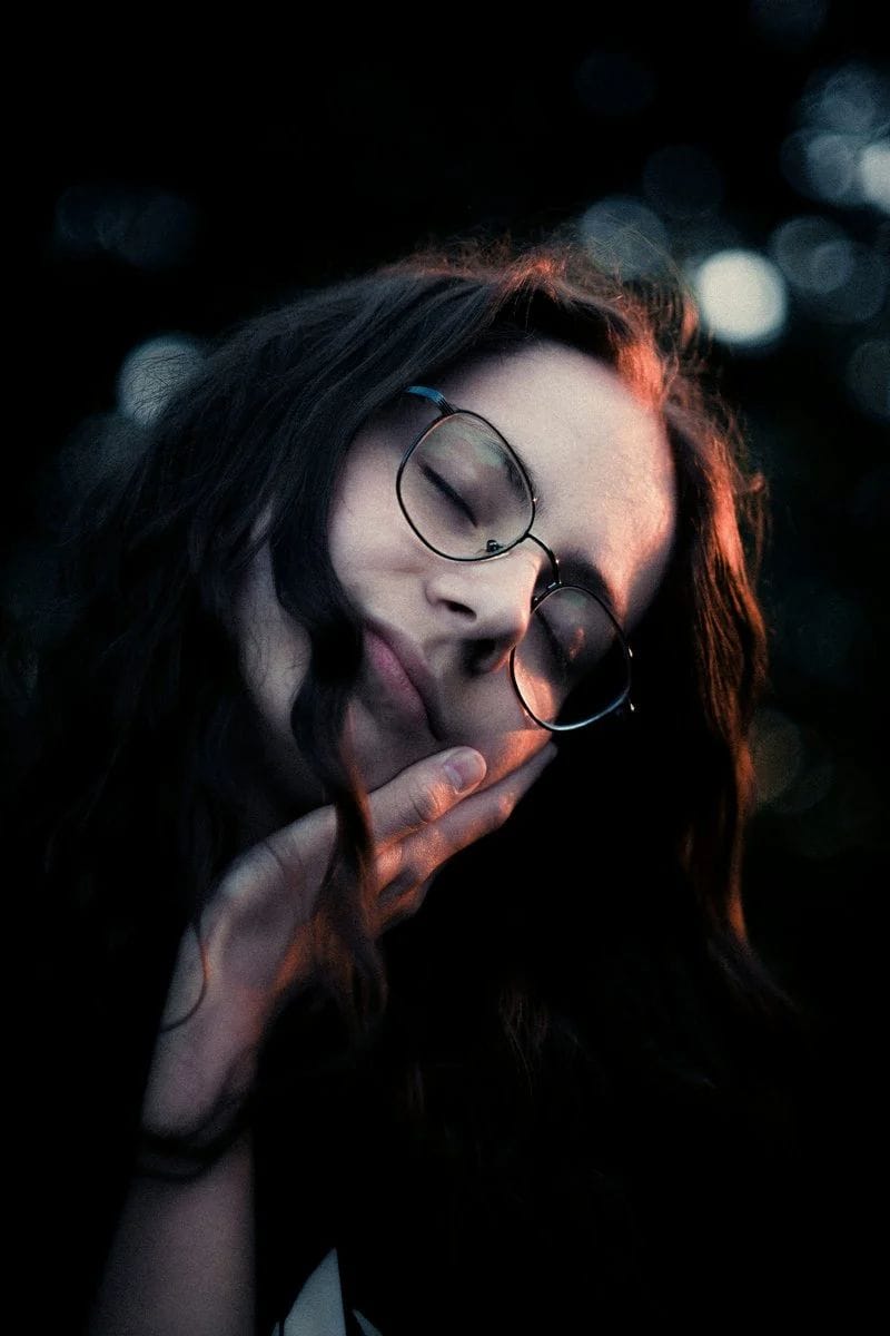 Young woman with glasses resting her head on hand photo – Free Pink Image on Unsplash Young woman with glasses resting her head on hand photo – Free Pink Image on Unsplash