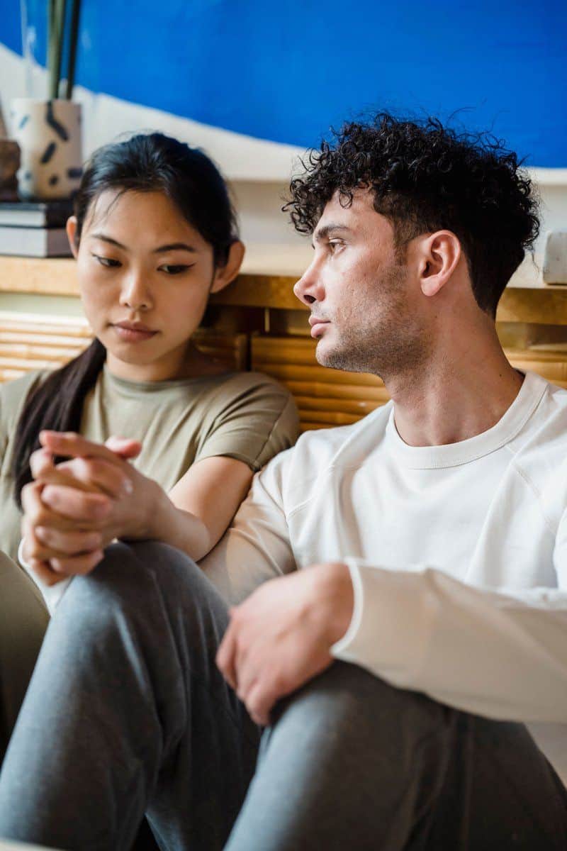 A Couple Seriously Looking at Each Other · Free Stock Photo