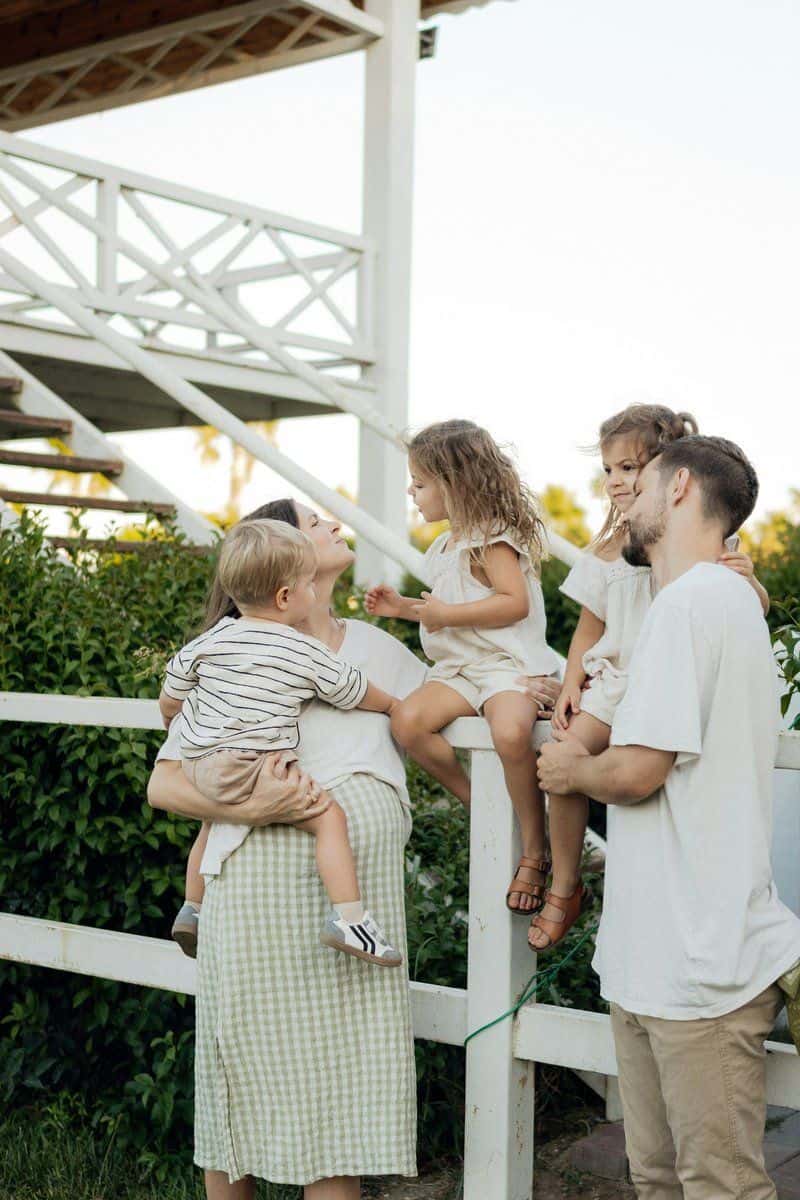 Family enjoying time together on a porch. photo – Free White ... Family enjoying time together on a porch. photo – Free White ...