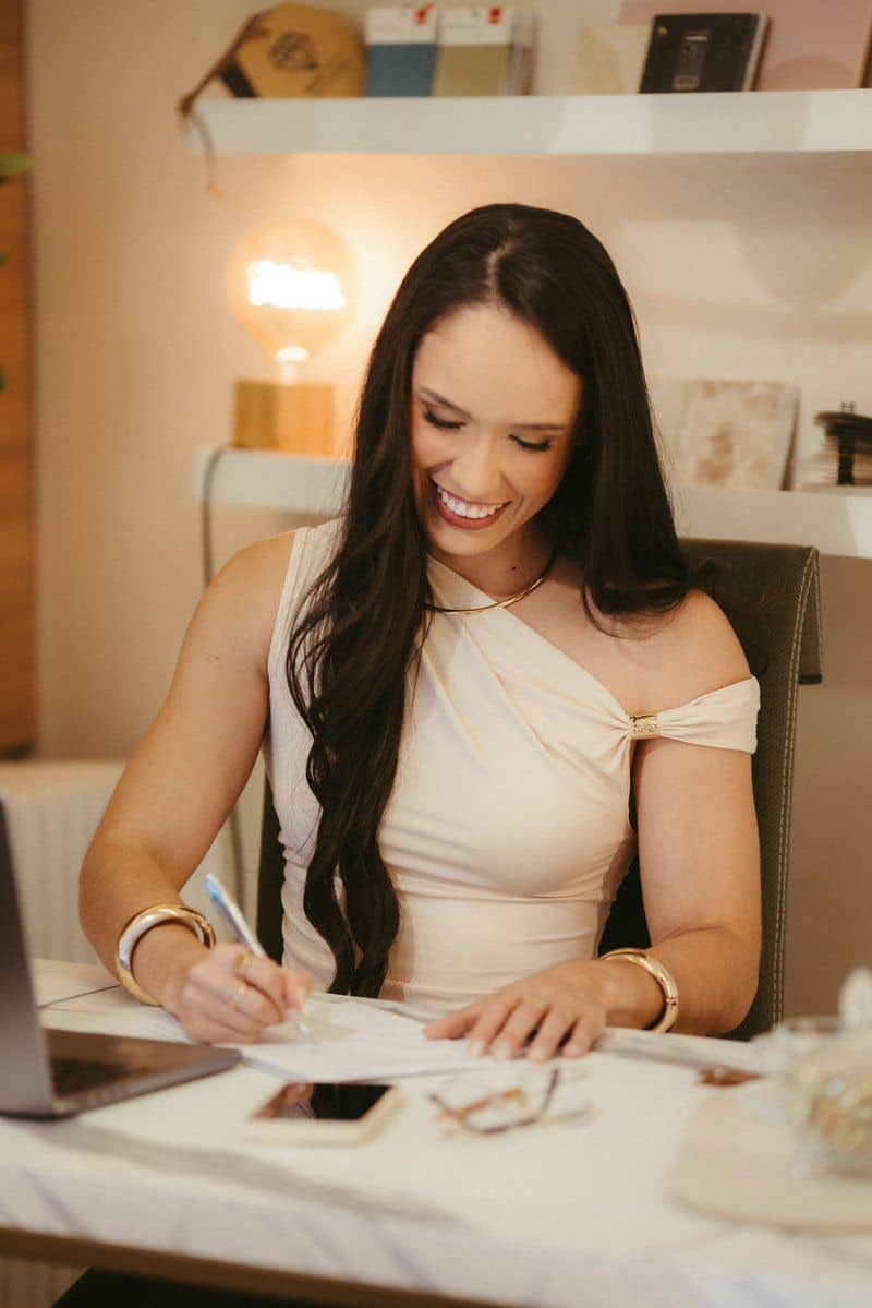 Smiling woman writing at a desk with a pen - Free Photo on ... Smiling woman writing at a desk with a pen - Free Photo on ...