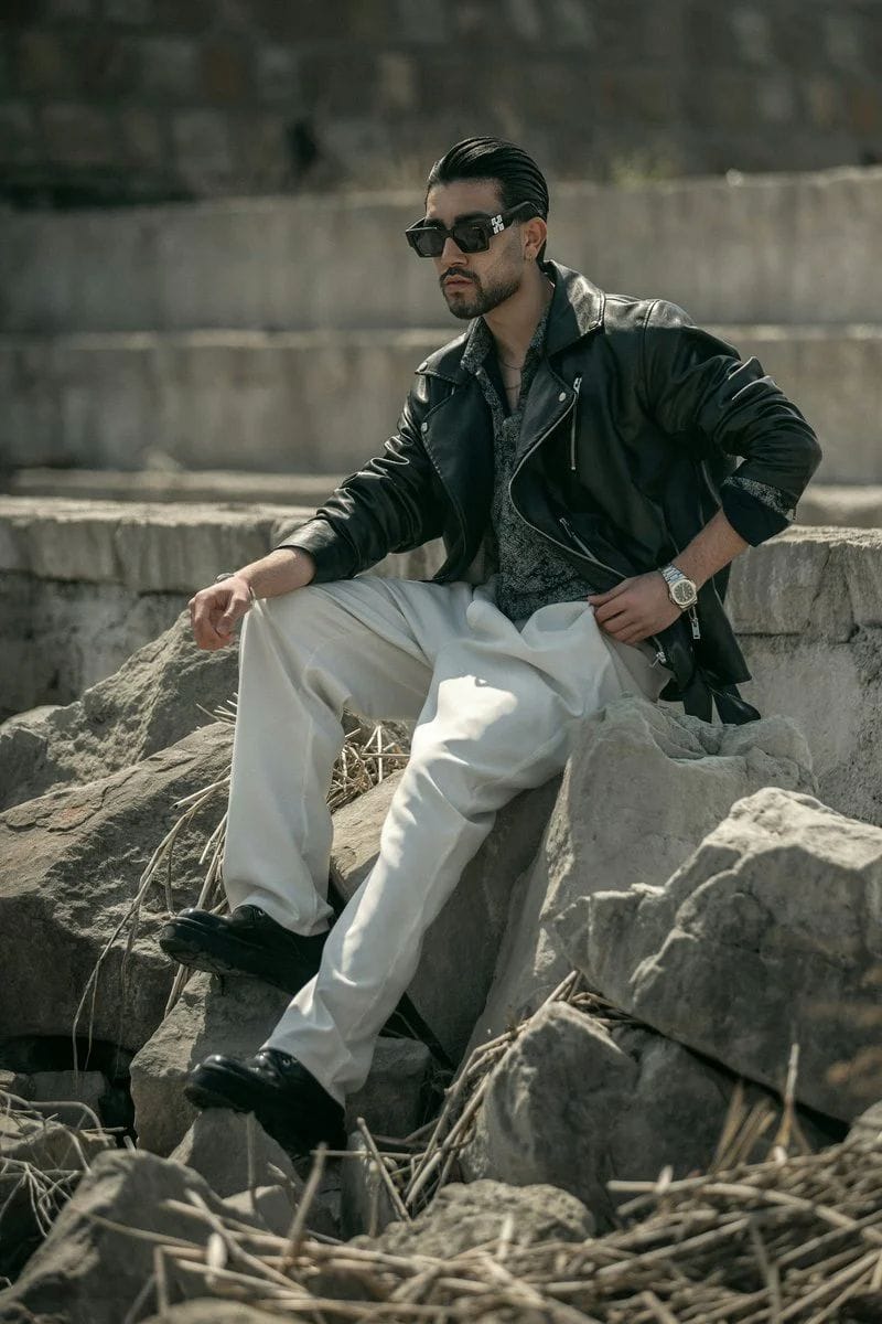 Stylish man poses outdoors, wearing sunglasses and leather jacket - Free Photo on Unsplash Stylish man poses outdoors, wearing sunglasses and leather jacket - Free Photo on Unsplash