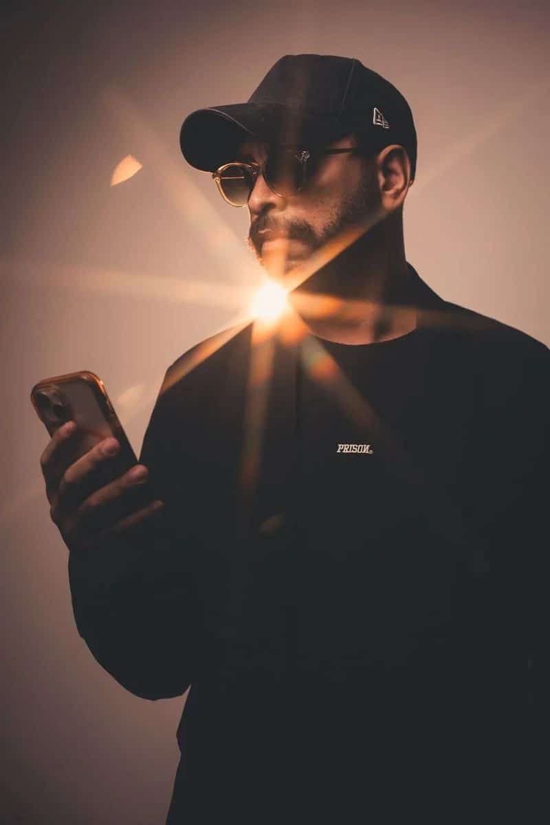 Man Using Cellphone in Dark Train · Free Stock Photo Man Using Cellphone in Dark Train · Free Stock Photo