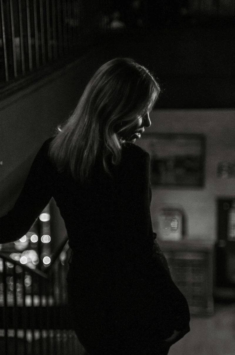 A woman in a black dress talking on a cell phone - Free Photo on Unsplash A woman in a black dress talking on a cell phone - Free Photo on Unsplash