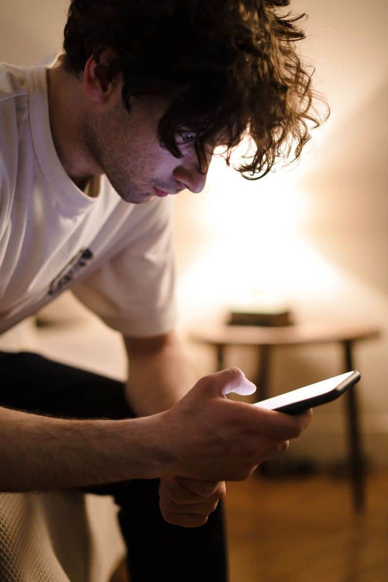 A Man Sitting on the Bed · Free Stock Photo A Man Sitting on the Bed · Free Stock Photo