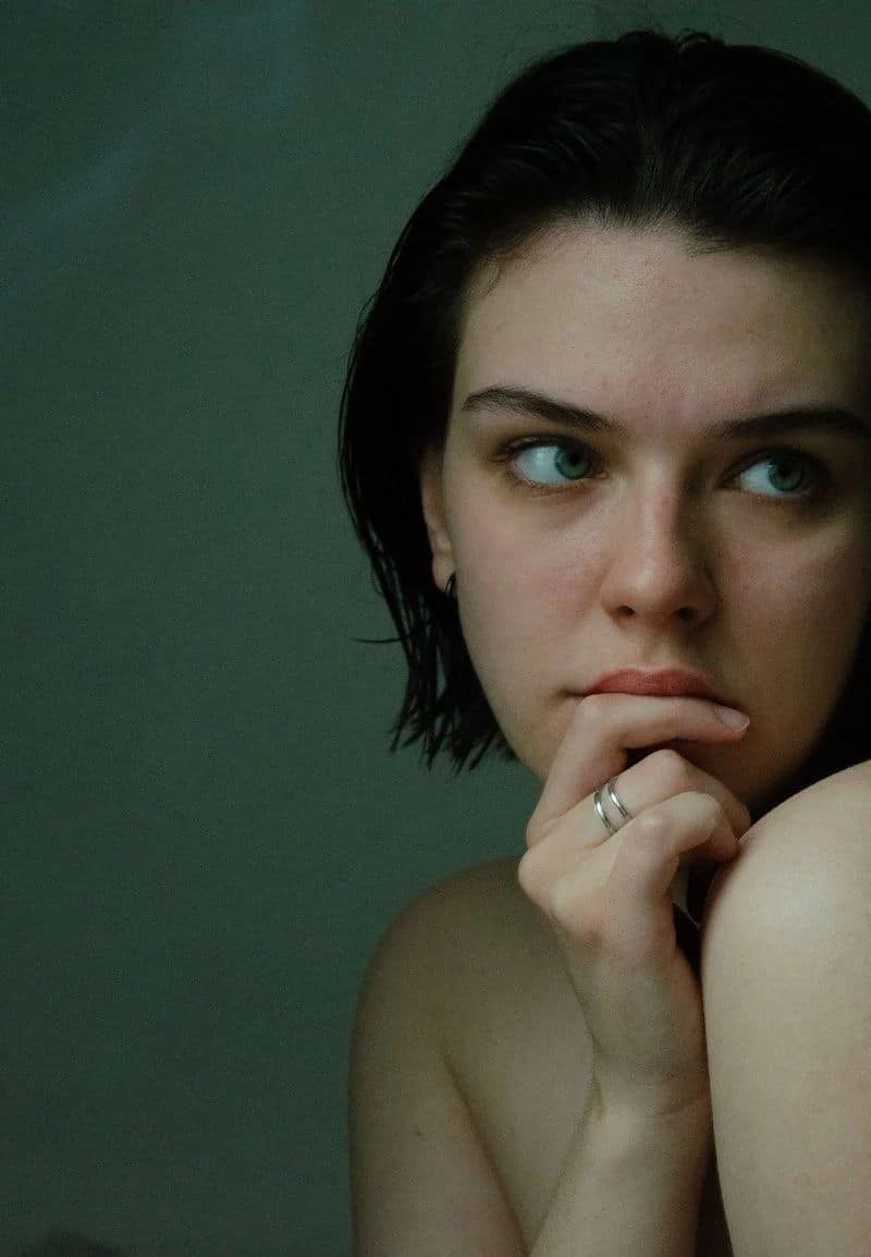 Thinking Woman with Hand on Chin · Free Stock Photo Thinking Woman with Hand on Chin · Free Stock Photo