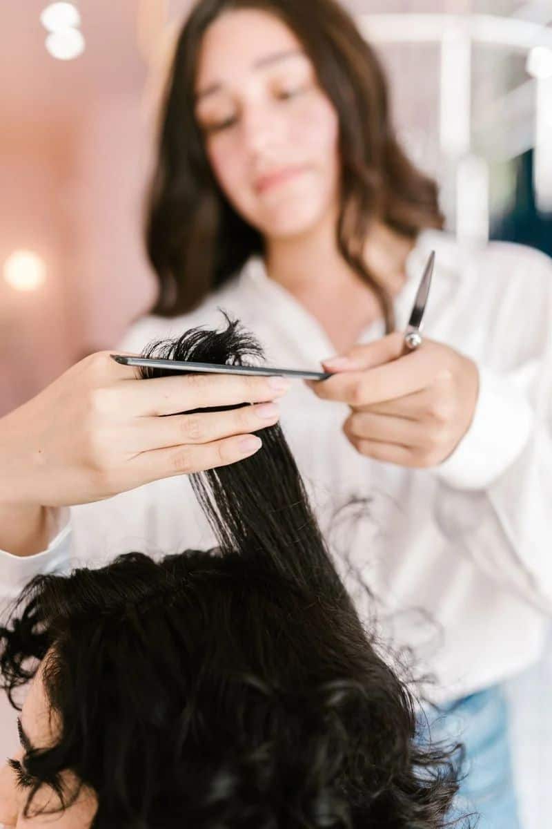 A Woman Doing Hair Cut · Free Stock Photo A Woman Doing Hair Cut · Free Stock Photo