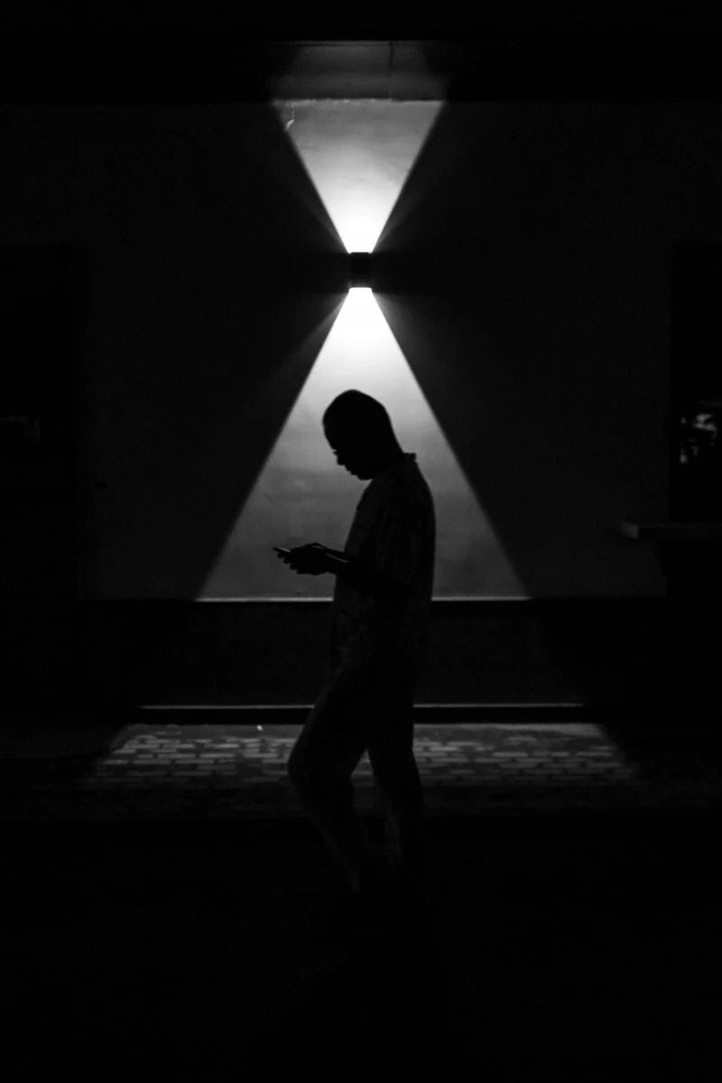 Silhouette of man walking on hallway photo – Free Grey Image ...
